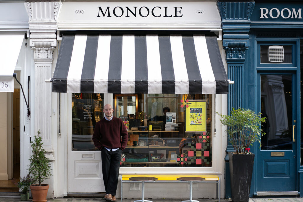 Monocle's manager Fabio standing in front of the Monocle shop in Marylebone